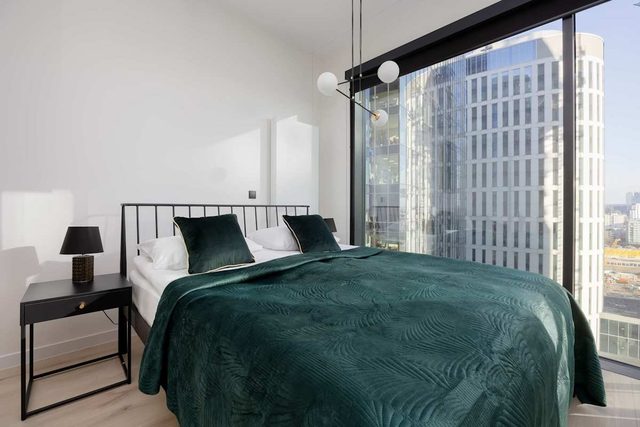 Prosta 69C Warszawa | Air Conditioned Studio with Free Gym Access and Balcony