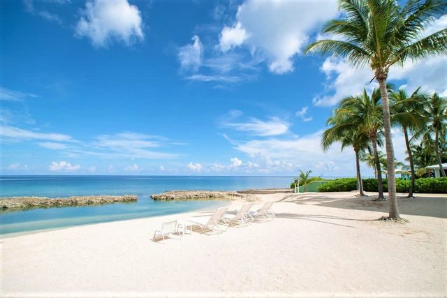 Spacious 3-Bedroom 3-Bathroom Beachfront Condo with Heated Pool