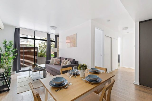 A Spacious 2BR Apt with a Courtyard & FREE Parking — Collingwood, Victoria