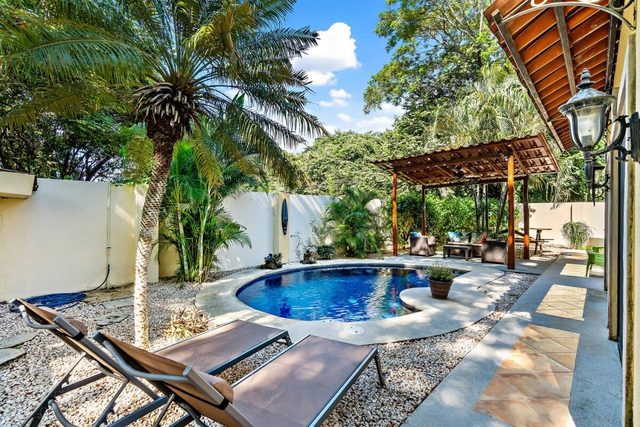 Inviting Home with Colorful Decor and Private Backyard Oasis with a Swimming Pool & Shaded Terrace — Surfside, Guanacaste Province