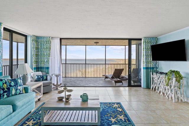 Harbour Tower 417 | Pristine Waterfront Residence with Panoramic Water Views