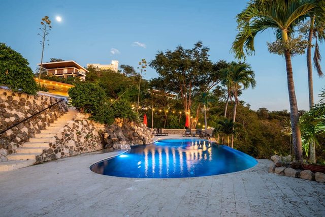 Stunning Mountaintop Property with Stylish Main Home, Private Guesthouse & Infinity Pool — Playa Potrero, Guanacaste Province