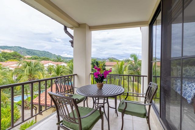 Chic Condo w/ Sparkling Pool & Lush Mountain Views from Shaded Balconies