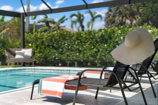 561 Blue Haven Retreat · 2000 Steps to the Beach — Naples, FL