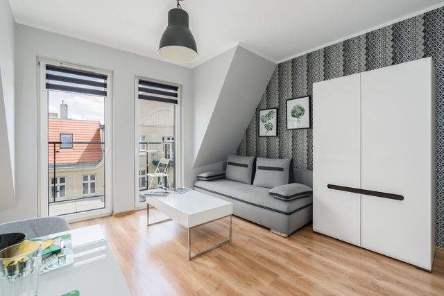 Różana 19 Poznań | Grey Apartment with Parking Near MTP