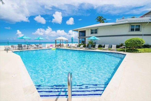 Beautiful 3 Bedroom Beachfront 7-Mile Condo