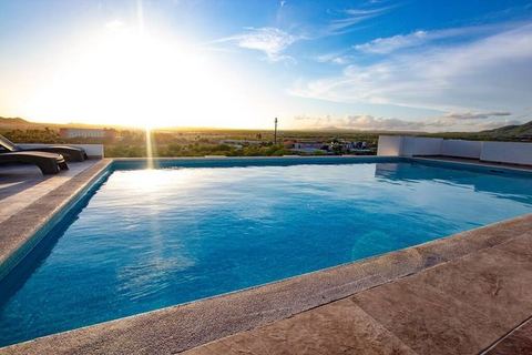 Modern Condo 2BR with Rooftop Pool Ocean Views  10 Min Walk to Medano Beach and Cabo San Lucas Downtown