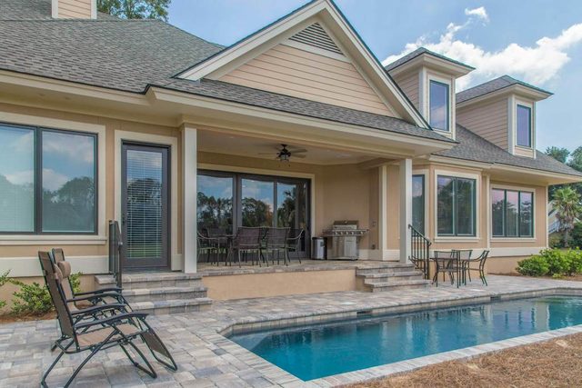 Modern home on 7th fairway with private pool & porch - near shopping & beaches