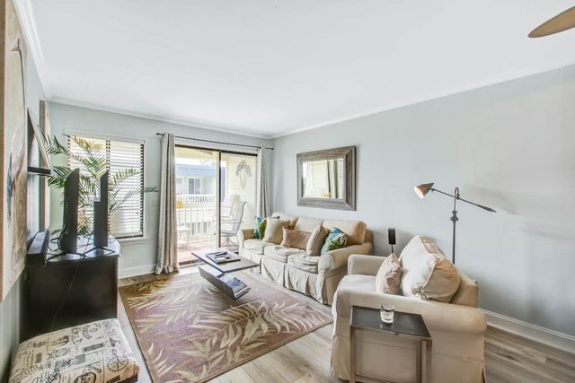 Comfortable villa one row away from the beach w/shared pool & grills