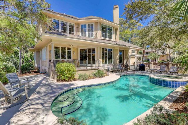 Two-story home with pool, balcony, deck, grill, & central AC - snowbirds welcome