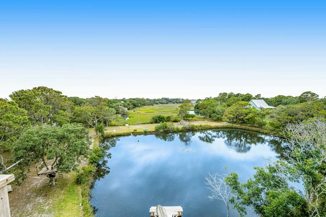 Fantastic coastal retreat with private dock, gas grill, two decks, & fast WiFi