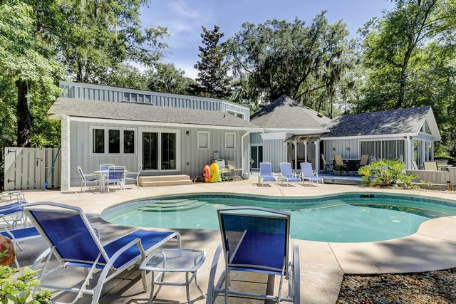 Luxurious lagoon home w/ kayaks, bikes, game room, cardio gym, & private pool