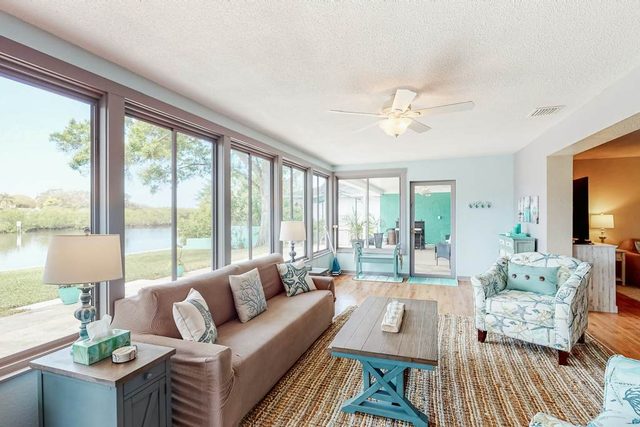 Unique Tropical Waterfront Retreat w/Private Dock, WiFi &Yard