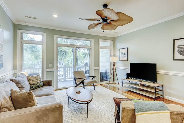 Beachy, three-story villa w/ deck & shared pool - walk downtown & to the beach
