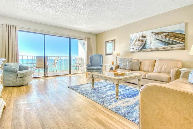 Beachfront coastal condo with private balcony WD on site pool and grills
