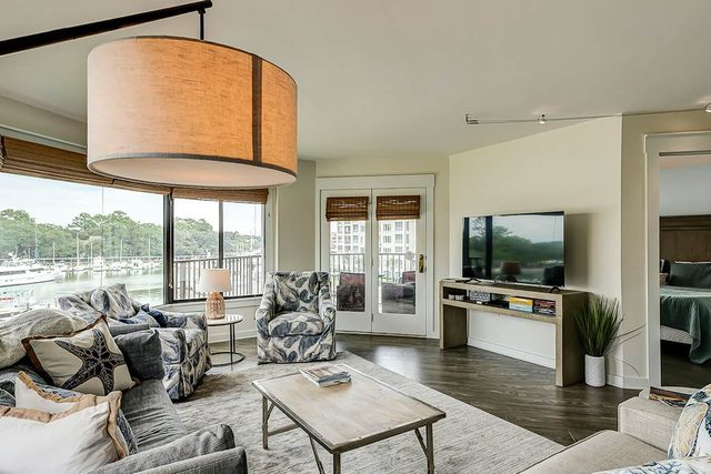 Yacht Club Villas | Updated corner condo with marina view, shared pool & hot tub