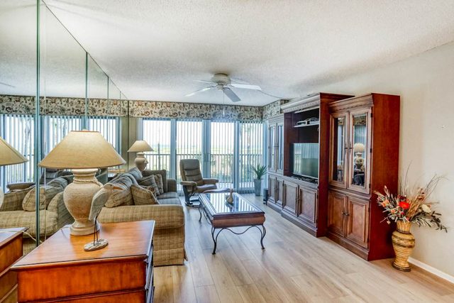Second floor condo with pool and tennis court private WD and central AC