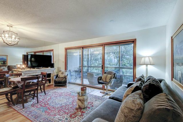 Comfortable ground-floor condo with enclosed patio, washer/dryer, & AC