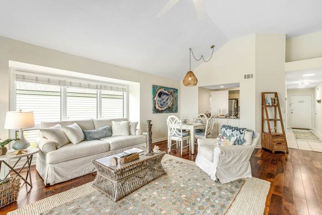 2nd floor villa with water views, lovely balcony & w/d - walk to Beach Club