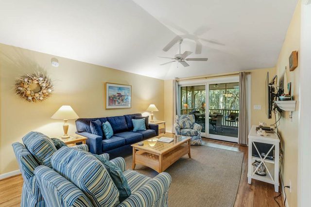 Charming Island Getaway with a Furnished Deck Offering Forest & Fairway Views