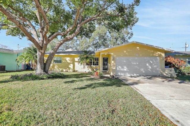 Stunning centrally located home with enclosed yard patio grill WD and AC