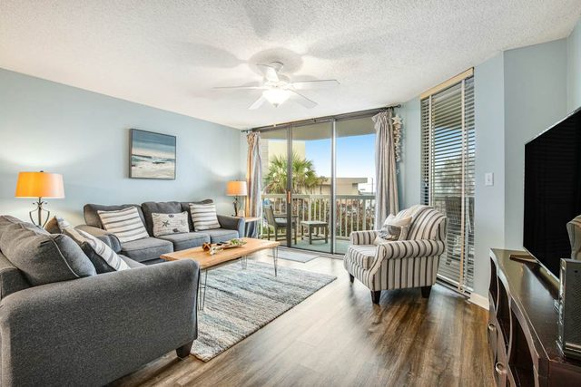 Updated oceanfront condo w/shared pools & views - just steps from the beach