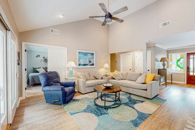Tree-lined home with beautiful patio, deck & firepit - near golf & the beach