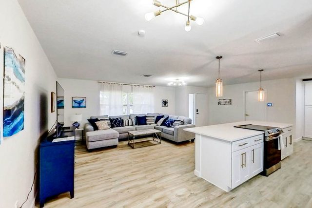 Bright and open home with private pool screened lanai enclosed yard and WD