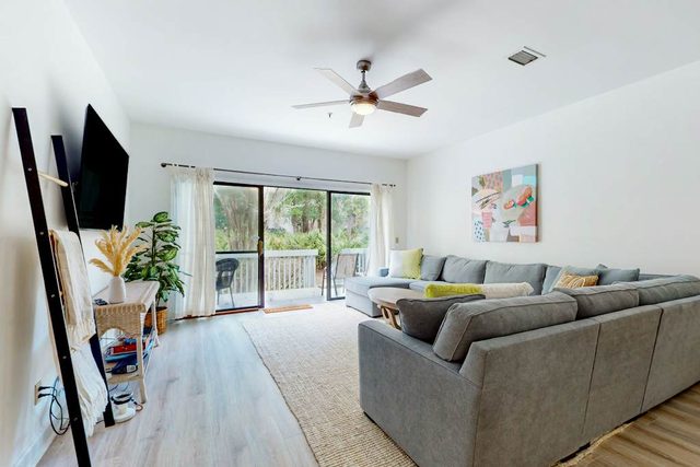 Delightful dog-friendly beach condo with pool, tennis, patio - walk to the beach