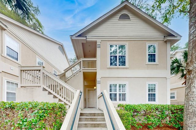 1st Floor Villa with pool, tennis, central AC, & washer/dryer