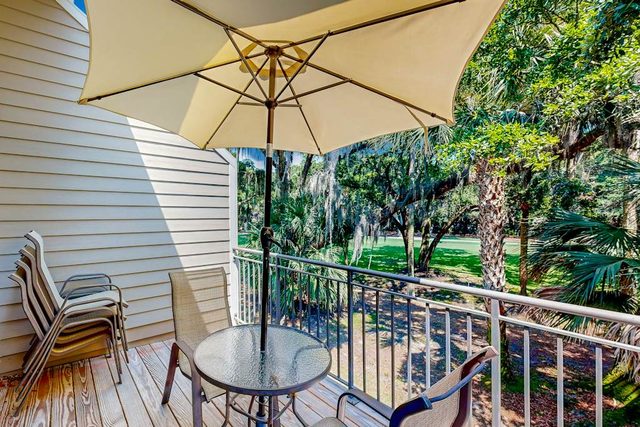 Updated townhome with golf course views, pool, and tennis