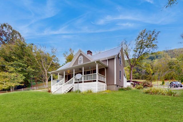 Smoky Mountain Farmhouse | Hot Tub | Porch Swings