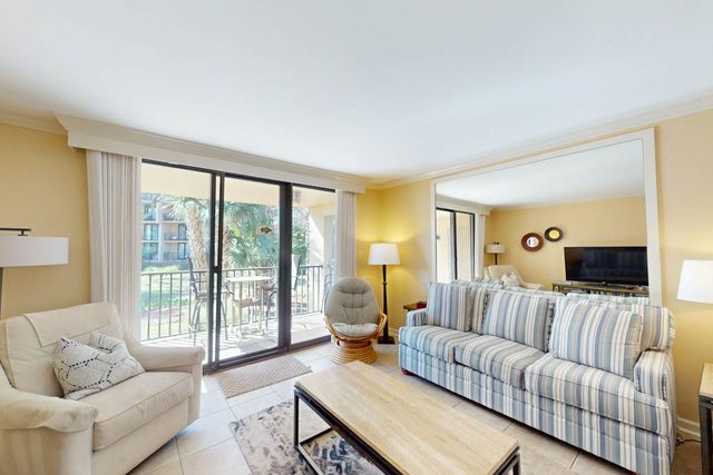 A Quiet Beach Getaway with Pools, Hot Tub, Tennis Courts, and Private Patio