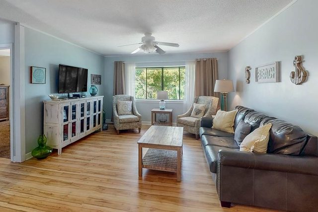 Welcoming villa with pool, beach access, patio, central AC, & washer/dryer