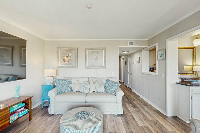 Beachfront condo w/ pool, tennis + pickleball, gym & balcony