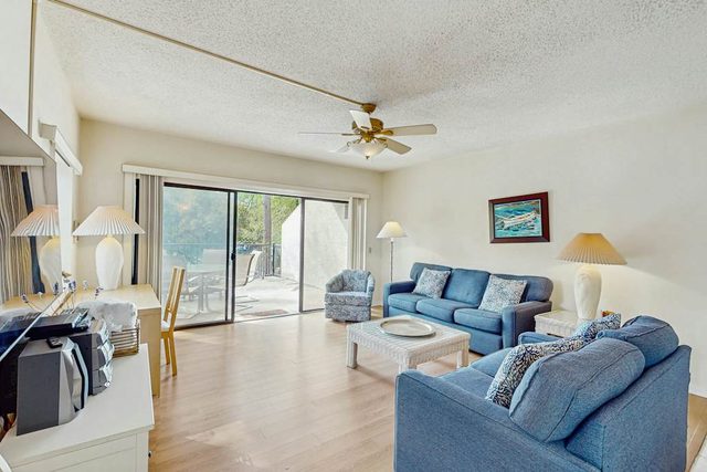 Inviting family-friendly condo with balcony, central AC, & outdoor pool