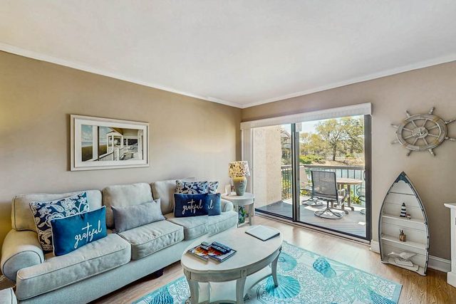 Lagoon waterfront villa with pools, hot tub, & gym - walk to beach