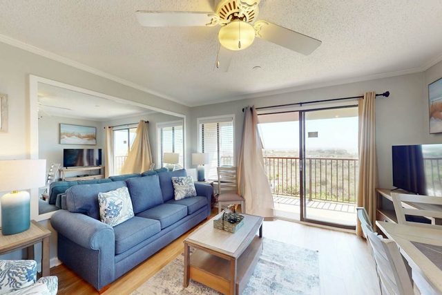 1st-floor condo near the beach with pool, tennis, balcony, gym, streaming, W/D