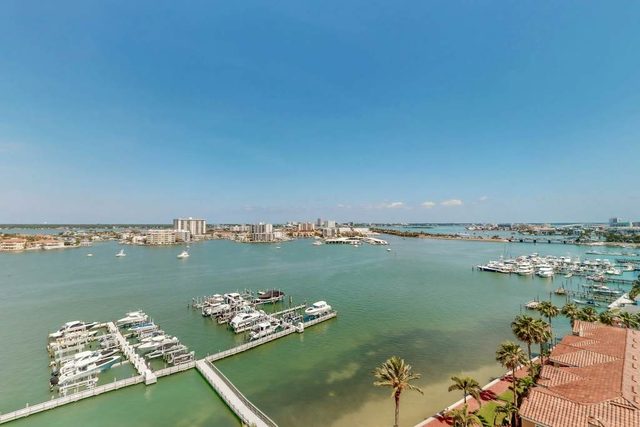 Luxury stunning waterfront condo Central AC pool snowbird friendly