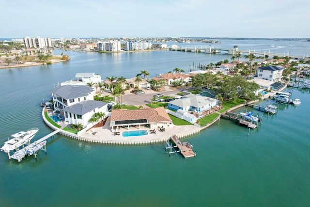Chic waterfront retreat with private pool and outdoor kitchen near the beach