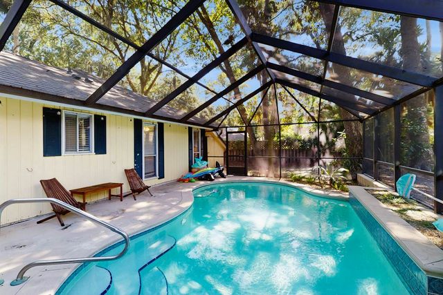 Home with private pool, fenced in yard, dog-friendly, walk to beach