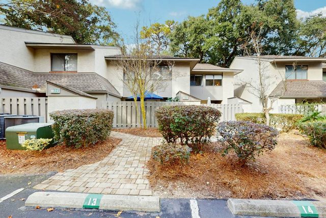 Dog-Friendly Condo w/ Fast WiFi, a Patio, & Shared Pool - Walk to the Beach